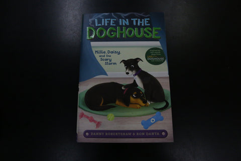Life in the Doghouse: Millie, Daisy, and the Scary Storm